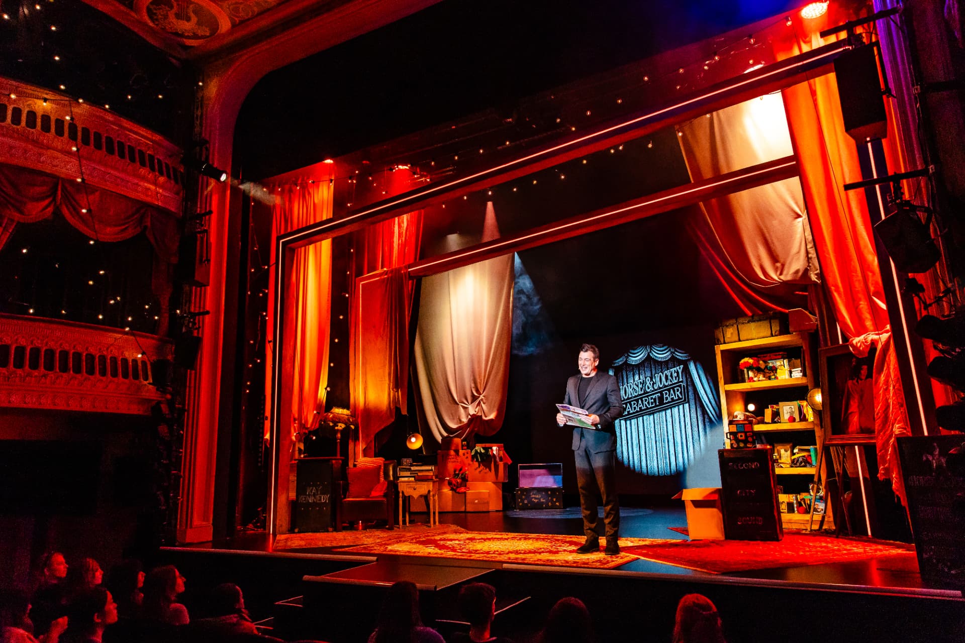 Full stage view of the Amaze set in red light